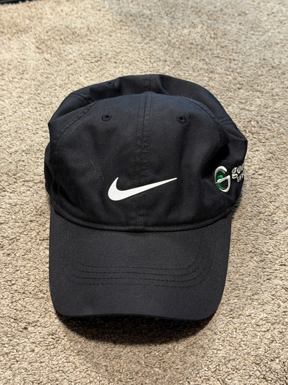 Nike Black Cap with White Swoosh and Green Accent